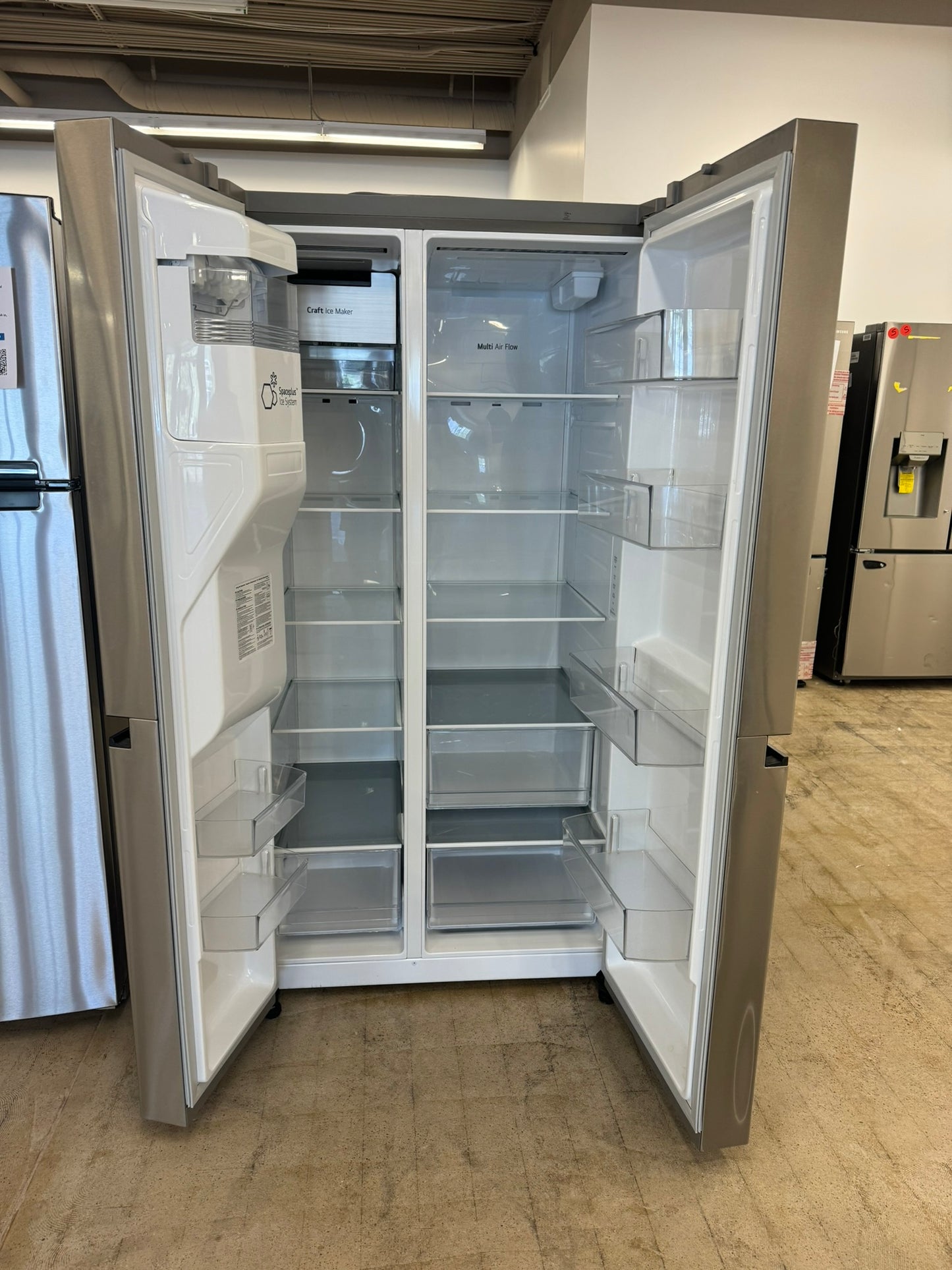 GORGEOUS GENTLY USED LG SIDE BY SIDE REFRIGERATOR MODEL: LRSXS2706S REF10074R