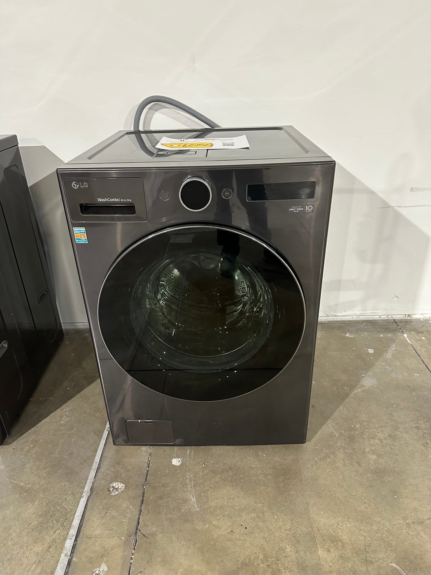 BEAUTIFUL MODEL! LG 5.0 Cu ft WashCombo All-in-One Washer-Dryer Combo MODEL: WM6998HBA WAS12459S