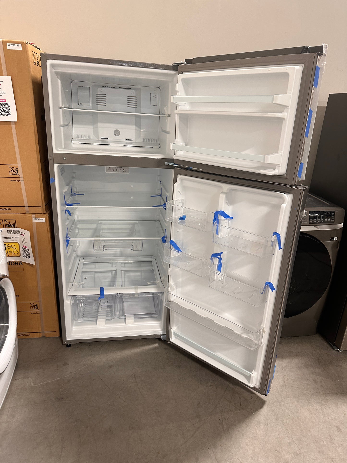 New Whirlpool 18 cu. ft. Top Freezer Refrigerator in Stainless Steel Model: WRT518SVZF REF13542
