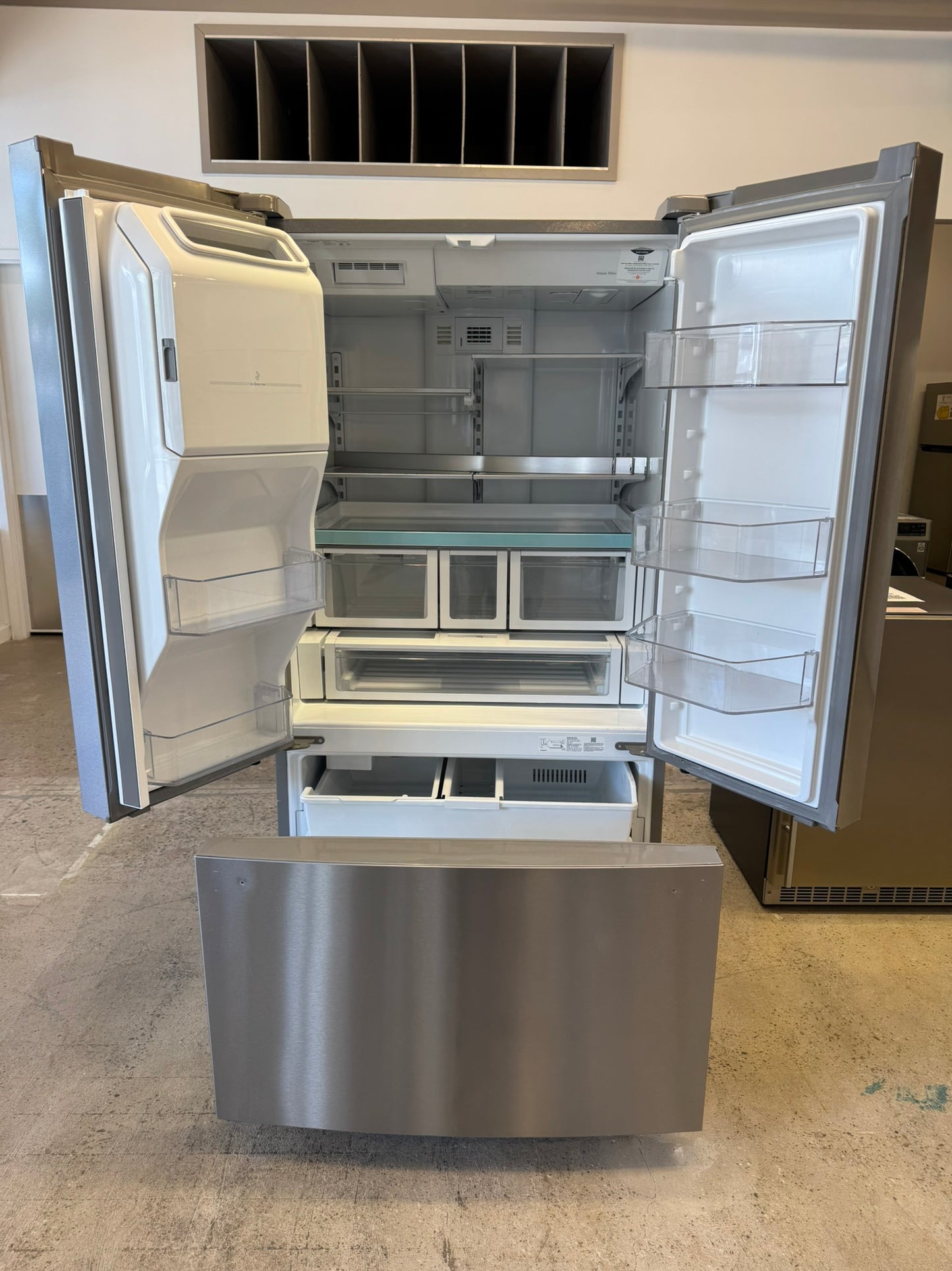 Whirlpool French Door Refrigerator with In-Door Water and Ice Maker MODEL: WRFF3536SZ REF10430R