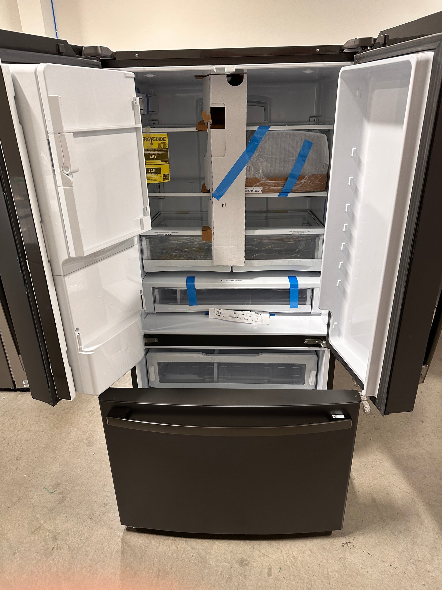 NEW GE - 27.7 Cu. Ft. French Door Refrigerator - Black Slate MODEL: GFE28GELDS REF13032