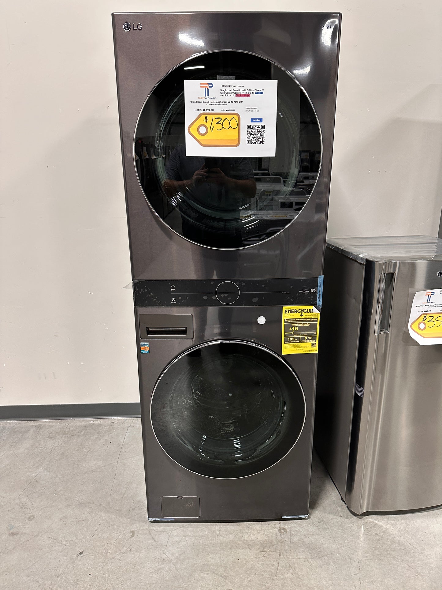 GORGEOUS NEW STACKED LAUNDRY CENTER - LG WASHER DRYER SET MODEL: WKEX200HBA WAS13156