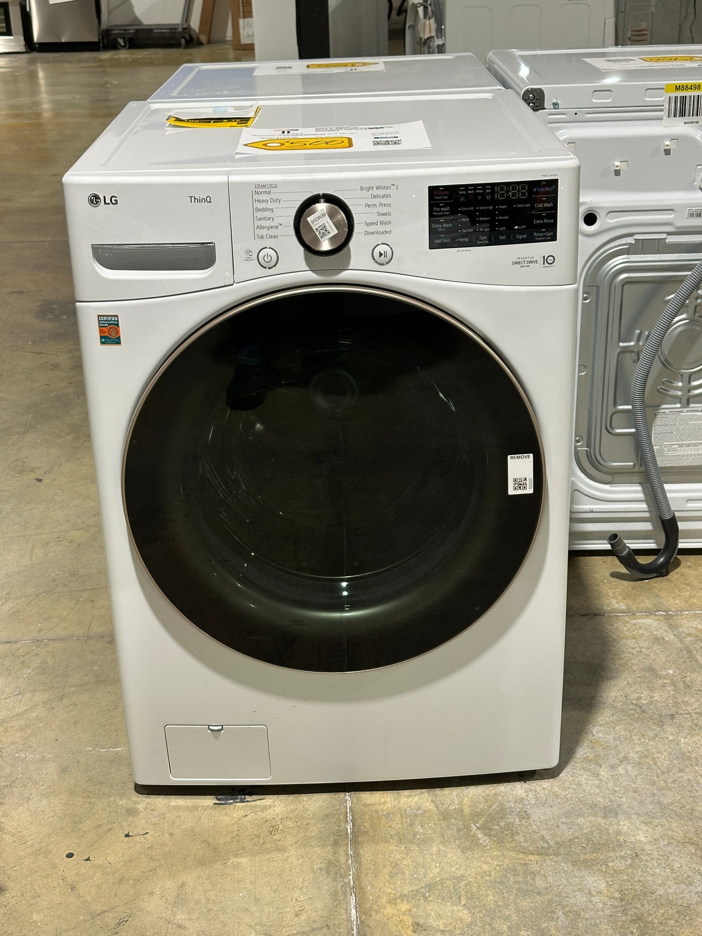 GORGEOUS MODEL LG 4.5 Cu. Ft. Front Load Washer MODEL: WM4000HWA WAS12436S