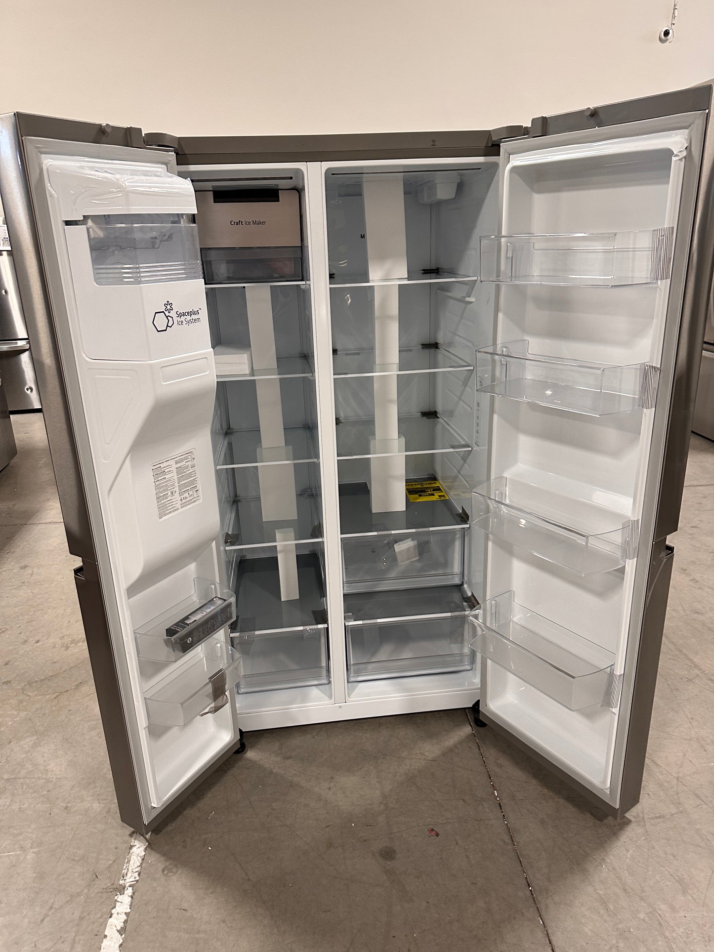Side-by-Side Refrigerator with SpacePlus Ice - Model:LRSXS2706S  REF12846