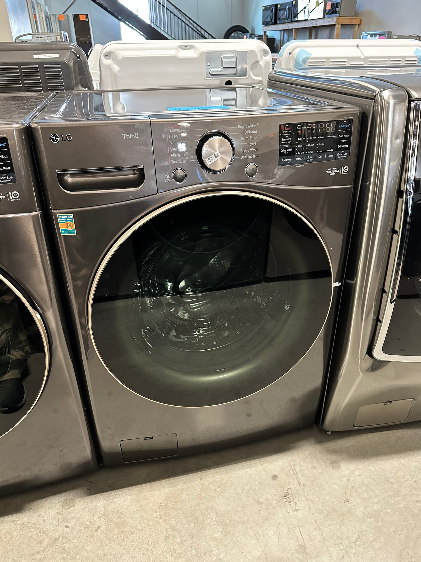 Beautiful New LG - 4.5 Cu. Ft. Stackable Front Load Washer with Steam - Black steel Model: WM4000HBA Was12676